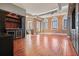 Living area features exposed brick, hardwood floors and a wet bar at 405 Central Ave # 700, St Petersburg, FL 33701