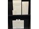 Samples of white cabinets, ethereal glow quartz, and floor tile options at 5633 Clearwater Ct, Lakewood Ranch, FL 34211