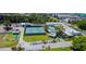 Aerial view of community amenities including tennis courts at 5980 Terrace Park Dr N # 113, St Petersburg, FL 33709