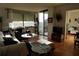 Living room with sliding glass doors leading to a balcony at 6218 Palma Del Mar S Blvd # 503, St Petersburg, FL 33715