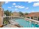 Balcony with pool and community view at 6321 Vista Verde E Dr, St Petersburg, FL 33707