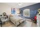 Bright bedroom with a comfortable bed and stylish decor at 6321 Vista Verde E Dr, St Petersburg, FL 33707