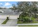 Well-maintained villa with attached garage and landscaping at 6325 Stone River Rd, Bradenton, FL 34203