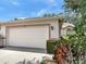 Charming home with a two-car garage, well-maintained landscaping, and lovely curb appeal at 6325 Stone River Rd, Bradenton, FL 34203