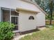 Exterior view of the home showing screened patio and well-maintained landscaping at 6325 Stone River Rd, Bradenton, FL 34203