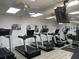 Modern fitness center with treadmills, strength training equipment, and TV at 6325 Stone River Rd, Bradenton, FL 34203
