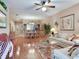 Spacious open-concept living area connecting seamlessly with the kitchen and dining spaces, perfect for entertaining at 6325 Stone River Rd, Bradenton, FL 34203