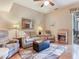 Inviting living room with comfortable seating, wooden floors, and tasteful décor at 6325 Stone River Rd, Bradenton, FL 34203