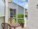 Screened patio offers a relaxing outdoor space with table and chairs at 6325 Stone River Rd, Bradenton, FL 34203