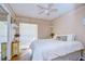 Charming bedroom with a queen-size bed and wood floors at 6411 Crystal Brook Dr, Tampa, FL 33625