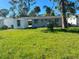 Spacious backyard with shed and trees at 735 Bertrend St, Englewood, FL 34223