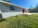 Side view of the house with new windows at 735 Bertrend St, Englewood, FL 34223