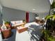 Virtually staged patio furniture on covered patio at 735 Bertrend St, Englewood, FL 34223