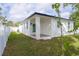 The home features a well-maintained backyard, offering a serene outdoor space for relaxation and recreation at 8317 N Ogontz Ave, Tampa, FL 33604