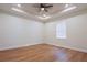 Bedroom featuring recessed lights, ceiling fan, and wood-look floors at 8317 N Ogontz Ave, Tampa, FL 33604