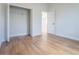 Bright bedroom features wood-look floors, closet and neutral paint at 8317 N Ogontz Ave, Tampa, FL 33604