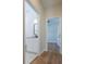 Hallway shot showing the view to a bathroom and bedroom at 8317 N Ogontz Ave, Tampa, FL 33604