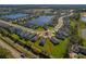 Aerial view of a house in a residential neighborhood at 13584 Old Creek Ct, Parrish, FL 34219