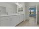 Elegant bathroom with double vanity and ample counter space at 13584 Old Creek Ct, Parrish, FL 34219