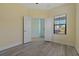 Bedroom with access to a small room at 13584 Old Creek Ct, Parrish, FL 34219