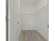 Spacious closet with wire shelving and wood-look flooring at 13584 Old Creek Ct, Parrish, FL 34219