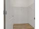Spacious closet with wire shelving and wood-look flooring at 13584 Old Creek Ct, Parrish, FL 34219
