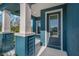 Stylish front door with glass panel and modern hardware at 13584 Old Creek Ct, Parrish, FL 34219