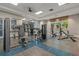 Modern weight room with various strength training equipment at 13584 Old Creek Ct, Parrish, FL 34219