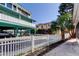 Exterior view of home with walkway and fence at 141 94Th Ave, Treasure Island, FL 33706