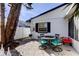 Outdoor patio with table, chairs, and grill at 141 94Th Ave, Treasure Island, FL 33706