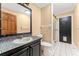 Bathroom with pedestal sink, shower, and multicolored tile at 35 Deerpath Dr, Oldsmar, FL 34677