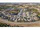 Aerial view showcasing a single-Gathering home in a residential community at 3602 Juneberry Dr, Wesley Chapel, FL 33543