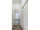Hallway with bathroom and additional storage at 3602 Juneberry Dr, Wesley Chapel, FL 33543