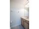 Simple bathroom with vanity, toilet and mirror at 3602 Juneberry Dr, Wesley Chapel, FL 33543