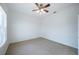 Simple bedroom with ceiling fan and window at 3602 Juneberry Dr, Wesley Chapel, FL 33543