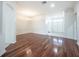 Spacious dining room with hardwood floors and a chandelier at 3602 Juneberry Dr, Wesley Chapel, FL 33543