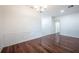 Bright dining room with hardwood floors and elegant chandelier at 3602 Juneberry Dr, Wesley Chapel, FL 33543