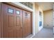 Double-door entry with a sidelight window at 3602 Juneberry Dr, Wesley Chapel, FL 33543