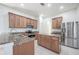 Modern kitchen featuring granite countertops and stainless steel appliances at 3602 Juneberry Dr, Wesley Chapel, FL 33543