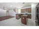 Open kitchen with stainless steel appliances and island at 3602 Juneberry Dr, Wesley Chapel, FL 33543