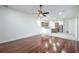 Bright living room with hardwood floors and kitchen views at 3602 Juneberry Dr, Wesley Chapel, FL 33543