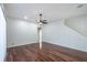 Spacious living room featuring hardwood floors and ceiling fan at 3602 Juneberry Dr, Wesley Chapel, FL 33543