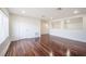 Spacious living room with hardwood floors and plenty of natural light at 3602 Juneberry Dr, Wesley Chapel, FL 33543