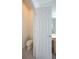 Clean powder room with toilet and pedestal sink at 3602 Juneberry Dr, Wesley Chapel, FL 33543