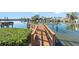 Wooden dock provides direct water access at 3738 Belle Vista E Dr, St Pete Beach, FL 33706