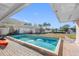 Refreshing rectangular pool with patio and water view at 3738 Belle Vista E Dr, St Pete Beach, FL 33706