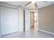 Bedroom with double doors and view of hallway at 4202 Las Vegas Dr, New Port Richey, FL 34653