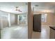 Living room with tile floors and view of kitchen and dining area at 4202 Las Vegas Dr, New Port Richey, FL 34653