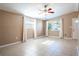 Bright living room with tile floors and ceiling fan at 4202 Las Vegas Dr, New Port Richey, FL 34653