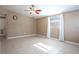Spacious living area featuring tile floors and a ceiling fan at 4202 Las Vegas Dr, New Port Richey, FL 34653